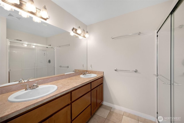 8148 Quinault Rd, Blaine, WA 98230 - full bath featuring a shower stall, double vanity, a sink, and tile patterned flooring