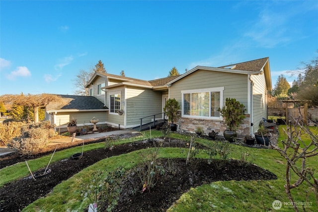 8148 Quinault Rd, Blaine, WA 98230 - view of front facade with a front yard and stone siding