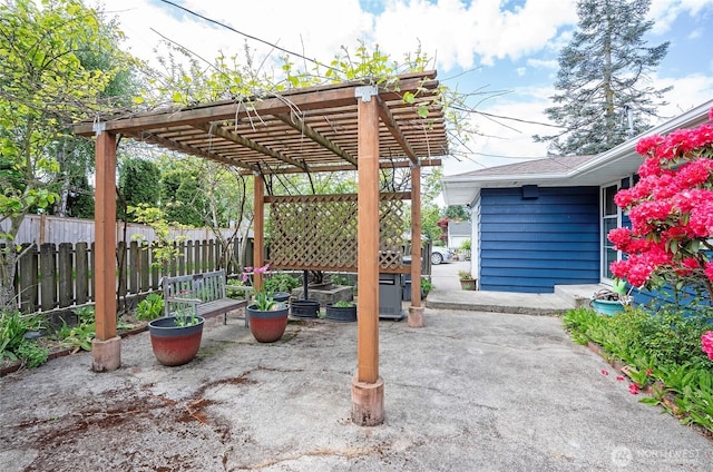 22332 10th Ave S, Des Moines, WA 98198 - view of patio featuring a pergola and fence