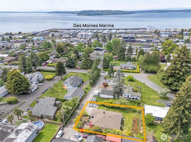22332 10th Ave S, Des Moines, WA 98198 - aerial view of property's location with property parcel outlined and a nearby body of water