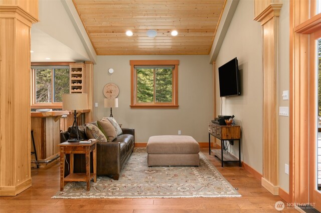 17650 Roaring Creek Rd, Leavenworth, WA 98826 - living room with baseboards, vaulted ceiling, wooden ceiling, and wood finished floors