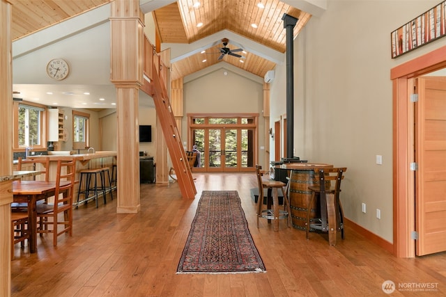 17650 Roaring Creek Rd, Leavenworth, WA 98826 - foyer entrance with wood ceiling, high vaulted ceiling, and hardwood / wood-style flooring