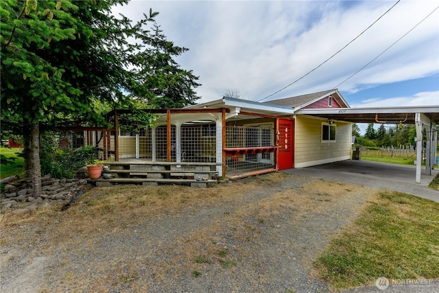 4109 S Reddick Rd, Port Angeles, WA 98363 - view of front of house featuring driveway and an attached carport