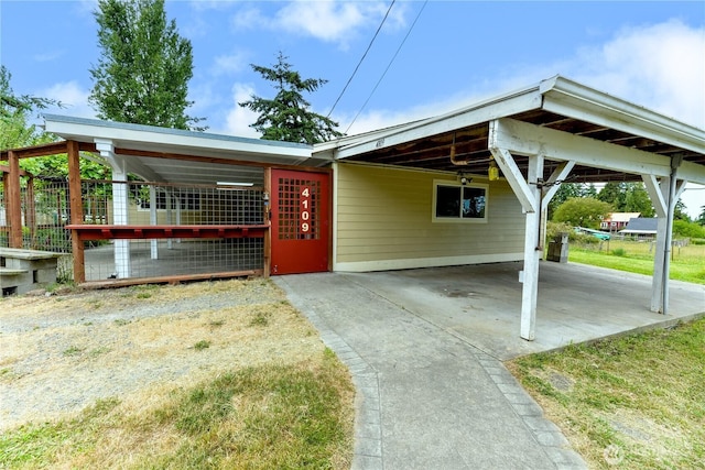 4109 S Reddick Rd, Port Angeles, WA 98363 - view of front of house featuring driveway and an attached carport
