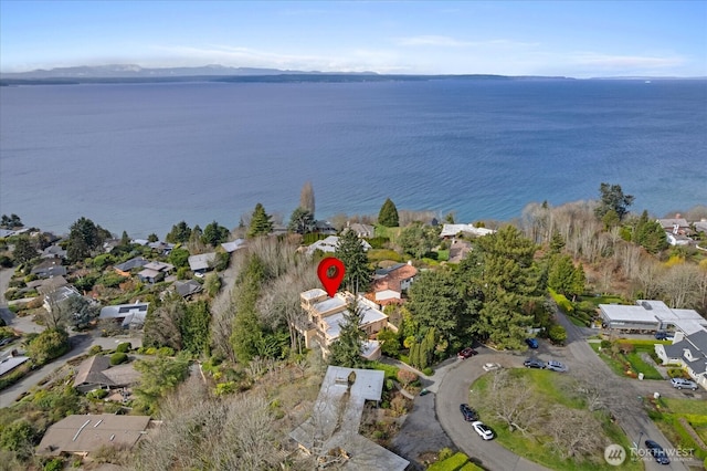 aerial view featuring a residential view and a water view