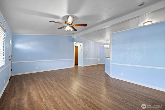 unfurnished room with wood finished floors, lofted ceiling with beams, a ceiling fan, and baseboards