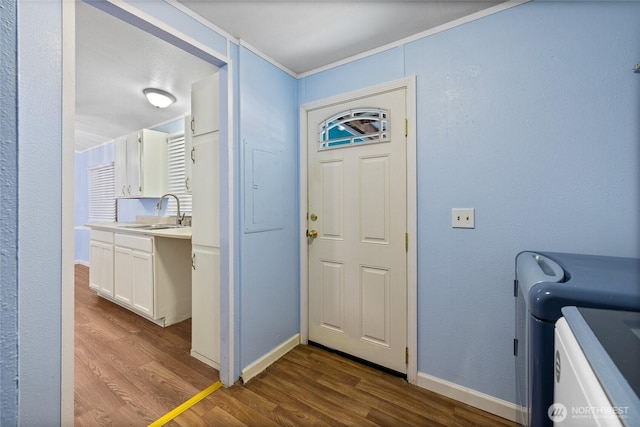 entrance foyer with baseboards and dark wood finished floors