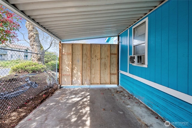 view of patio featuring cooling unit and fence