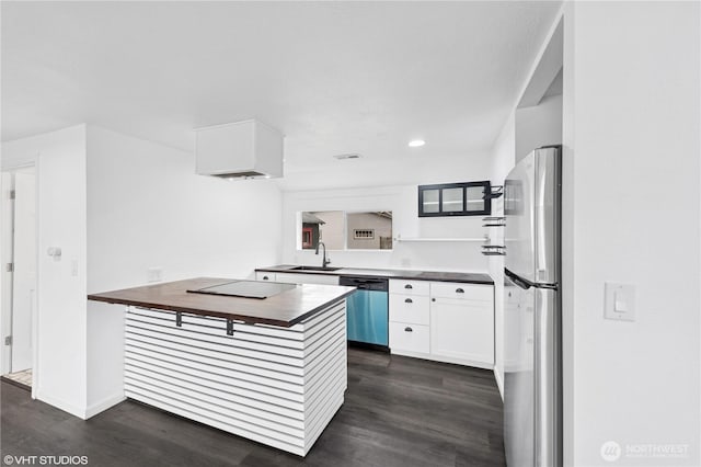1210 Madison St, Aberdeen, WA 98520 - kitchen with a sink, dark wood finished floors, white cabinets, and stainless steel appliances