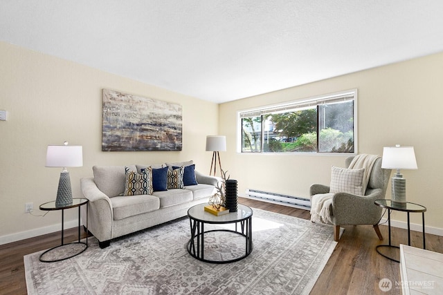 living area featuring a baseboard radiator, baseboards, and wood finished floors