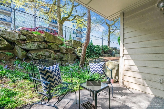 view of patio with fence