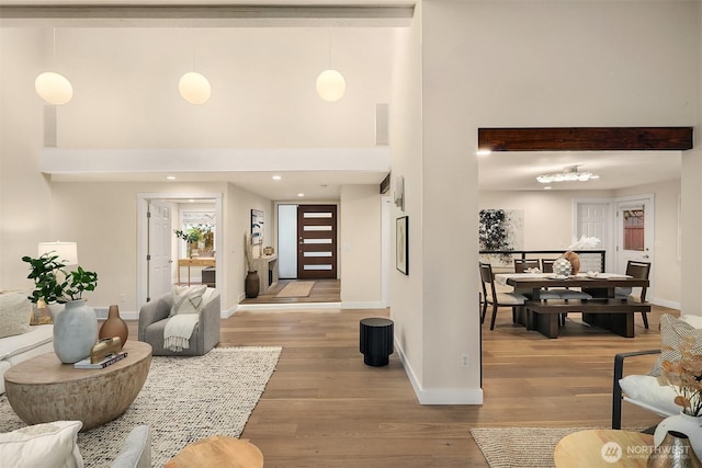 11820 NE 145th St, Kirkland, WA 98034 - foyer featuring a towering ceiling, wood finished floors, and baseboards