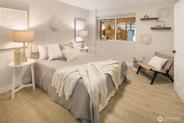 11820 NE 145th St, Kirkland, WA 98034 - bedroom featuring wood finished floors and baseboards