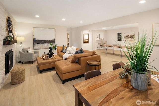 11820 NE 145th St, Kirkland, WA 98034 - living area with a fireplace, light wood finished floors, and recessed lighting