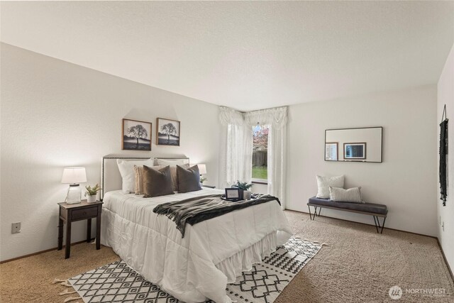 bedroom with light carpet