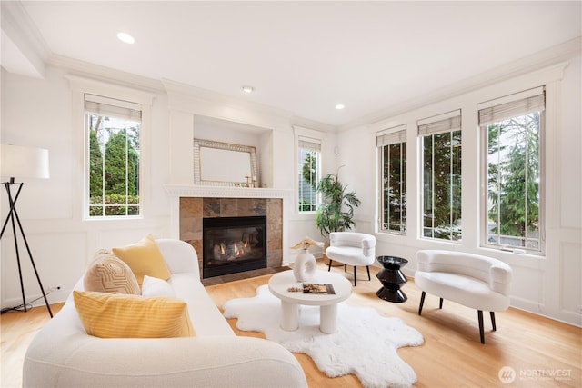 7018 117th Pl NE, Kirkland, WA 98033 - interior space with light wood-style floors, ornamental molding, and a wealth of natural light