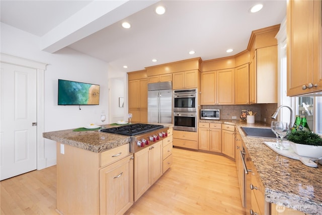 7018 117th Pl NE, Kirkland, WA 98033 - kitchen featuring tasteful backsplash, light brown cabinets, a sink, appliances with stainless steel finishes, and light wood finished floors