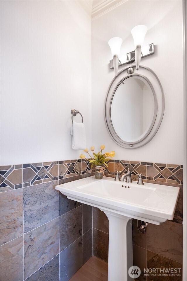 7018 117th Pl NE, Kirkland, WA 98033 - bathroom with ornamental molding and tile walls