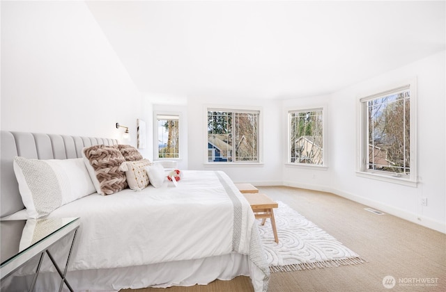 7018 117th Pl NE, Kirkland, WA 98033 - carpeted bedroom featuring visible vents and baseboards
