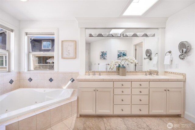 7018 117th Pl NE, Kirkland, WA 98033 - full bath featuring a sink, tile patterned flooring, double vanity, and a jetted tub