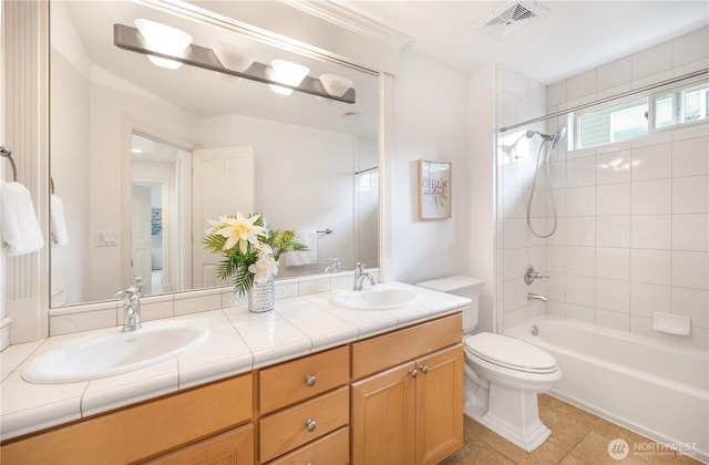 7018 117th Pl NE, Kirkland, WA 98033 - bathroom with a sink, visible vents, toilet, and double vanity