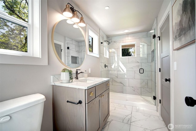 428 20th Ave, Kirkland, WA 98033 - full bath featuring toilet, vanity, marble look tile flooring, a shower stall, and recessed lighting