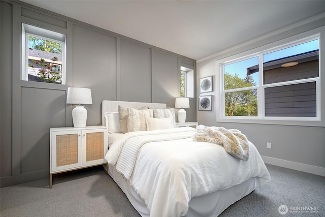 428 20th Ave, Kirkland, WA 98033 - bedroom with carpet floors, ornamental molding, a decorative wall, and baseboards