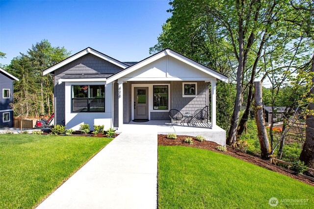 428 20th Ave, Kirkland, WA 98033 - view of front of house featuring a porch and a front yard
