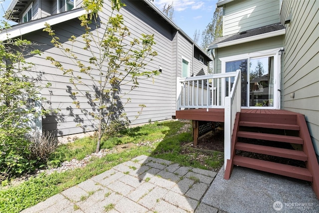 exterior space with a deck and a patio area