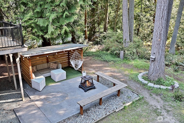 view of patio featuring a fire pit