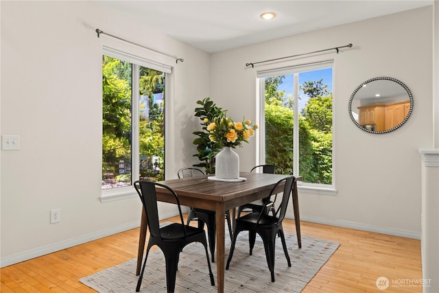 17605 244th Ave SE, Maple Valley, WA 98038 - dining room with baseboards, plenty of natural light, light wood-style flooring, and recessed lighting