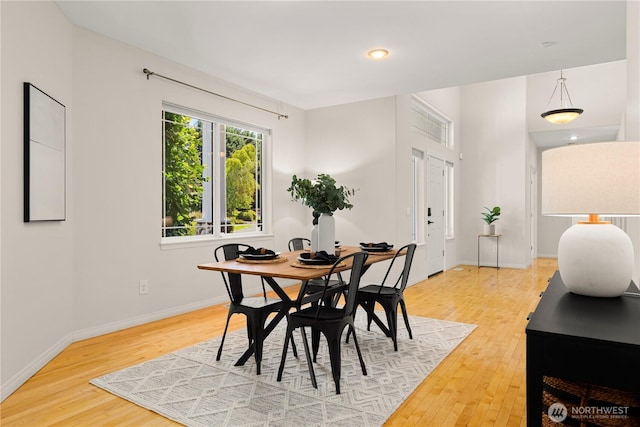 17605 244th Ave SE, Maple Valley, WA 98038 - dining area with light wood-style floors and baseboards
