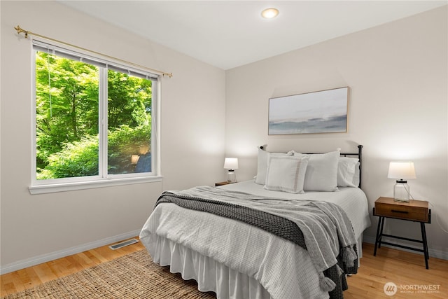 17605 244th Ave SE, Maple Valley, WA 98038 - bedroom featuring wood finished floors, baseboards, and recessed lighting