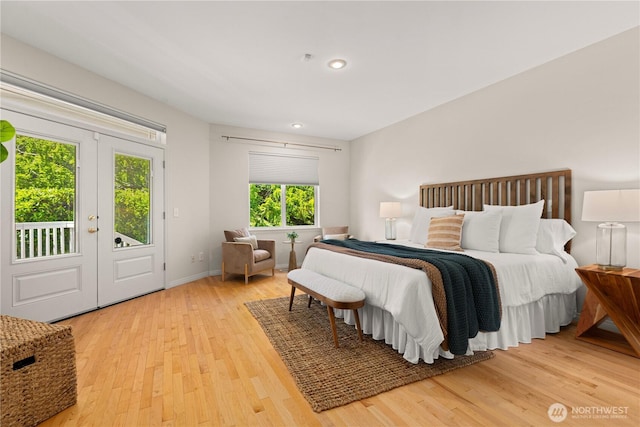 17605 244th Ave SE, Maple Valley, WA 98038 - bedroom featuring light wood-style flooring, access to exterior, recessed lighting, baseboards, and french doors