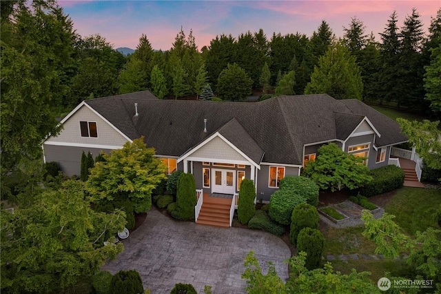 17605 244th Ave SE, Maple Valley, WA 98038 - craftsman inspired home with french doors, stairs, and roof with shingles