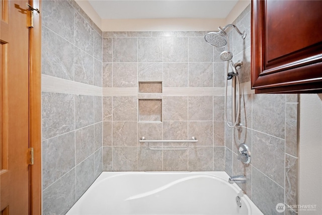 bathroom featuring  shower combination