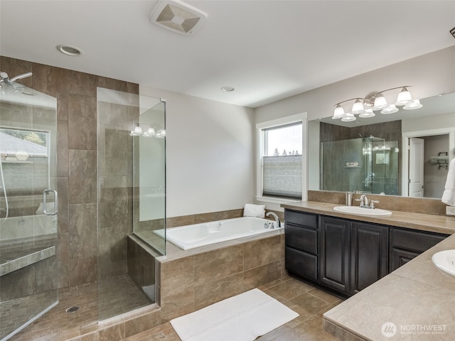 4206 NE 132nd St, Vancouver, WA 98686 - full bath featuring tile patterned floors, visible vents, a shower stall, a garden tub, and vanity