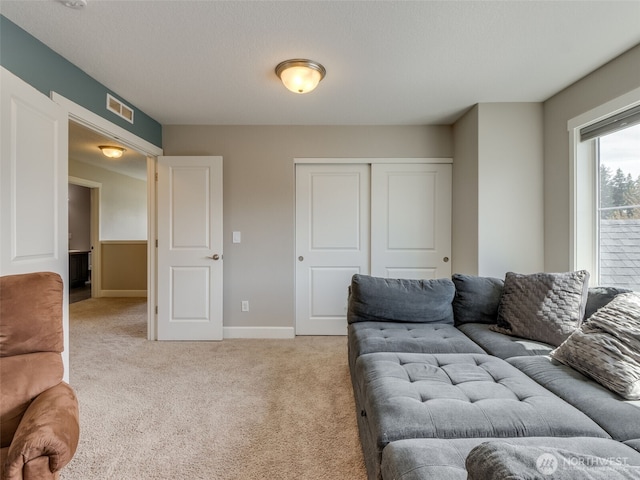 4206 NE 132nd St, Vancouver, WA 98686 - living area with light carpet, visible vents, and baseboards