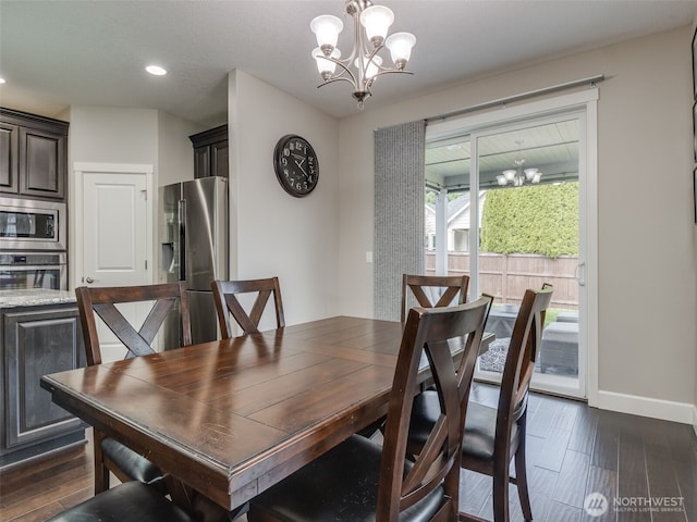 4206 NE 132nd St, Vancouver, WA 98686 - dining room featuring baseboards, recessed lighting, a chandelier, and dark wood-style flooring