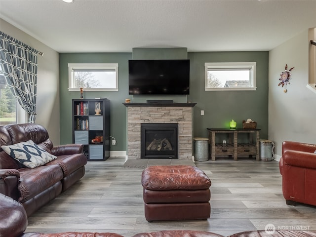 4206 NE 132nd St, Vancouver, WA 98686 - living area with a fireplace, wood finished floors, and a wealth of natural light