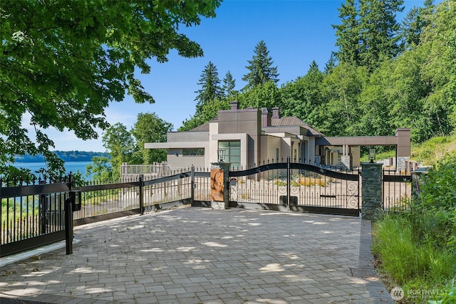 view of gate with fence