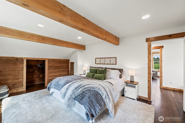 bedroom with recessed lighting, wood-type flooring, beam ceiling, and baseboards