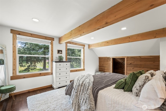 bedroom with baseboards, vaulted ceiling with beams, wood finished floors, and recessed lighting