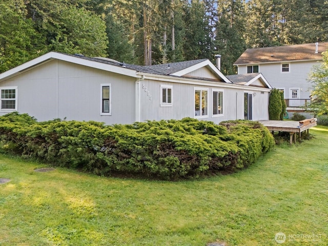 5255 Apollo Rd, Langley, WA 98260 - rear view of property with a deck, a yard, and a shingled roof