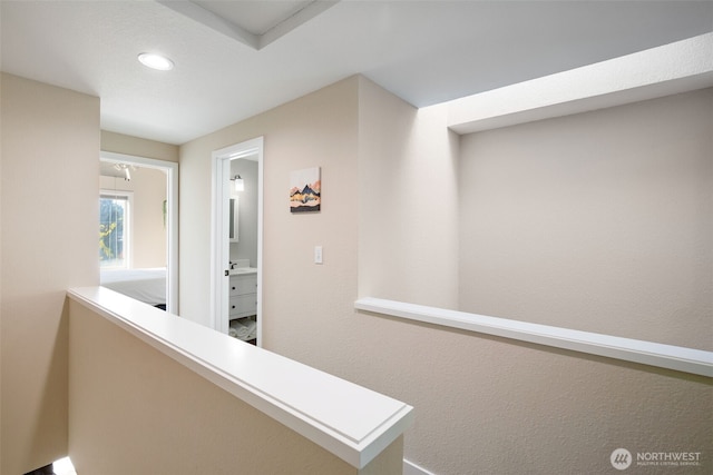 hallway featuring recessed lighting