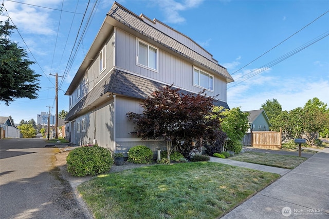 1713 17th St, Everett, WA 98201 - view of front of home featuring a shingled roof, a front yard, and fence