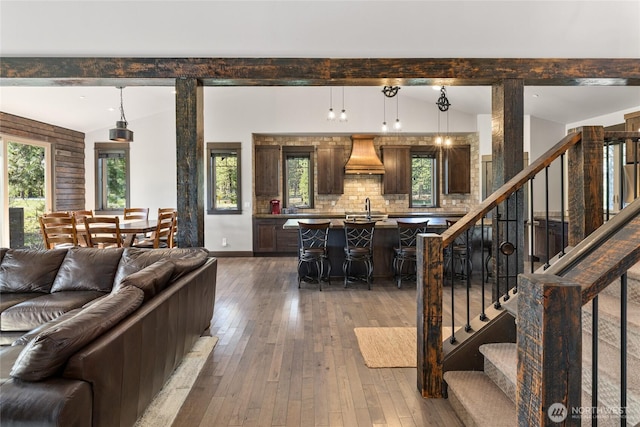 70 Monabel Ct, Cle Elum, WA 98922 - living room with beam ceiling, baseboards, stairway, and hardwood / wood-style floors