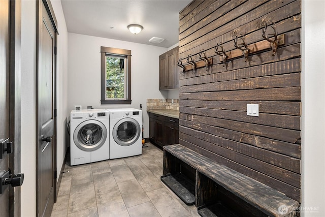 70 Monabel Ct, Cle Elum, WA 98922 - washroom with separate washer and dryer, visible vents, and cabinet space