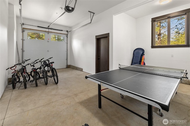 70 Monabel Ct, Cle Elum, WA 98922 - rec room featuring concrete flooring, a garage, and plenty of natural light