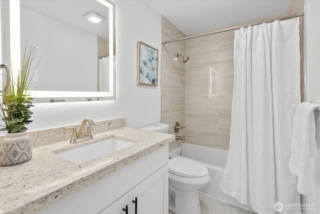 full bath featuring toilet, shower / bathtub combination with curtain, and vanity